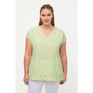 Blouse à fleurs. Décolleté en V, manches courtes. Cordon de serrage à la base.