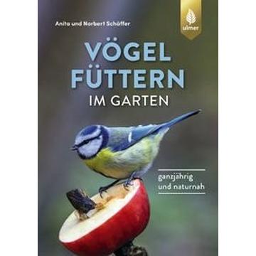 Vögel füttern im Garten