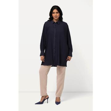 Blusa dal taglio svasato con plissettatura, collo da camicia e maniche lunghe