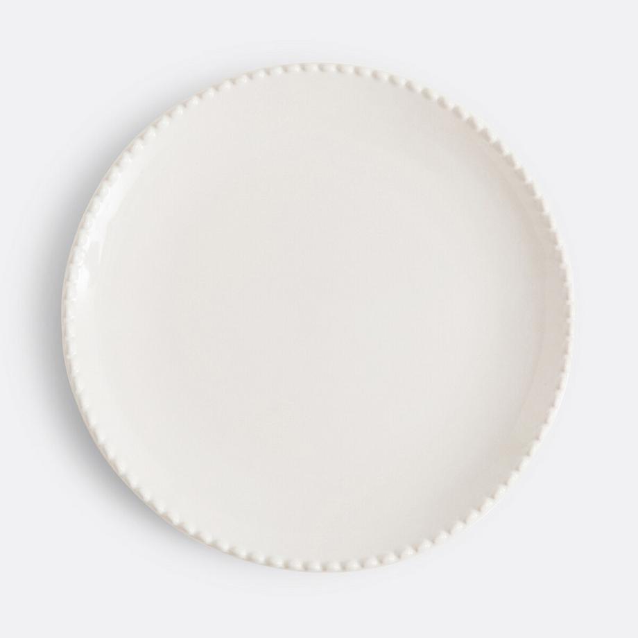 Lot 4 assiettes plates en grès liseré perlé