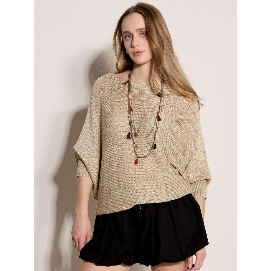 Gold schimmernder Pullover mit offenem Strickmuster