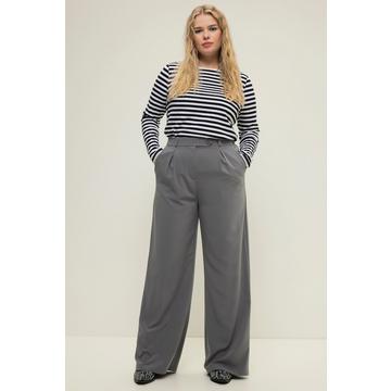 Pantalon à taille haute et jambe large. Pinces, taille partiellement élastique