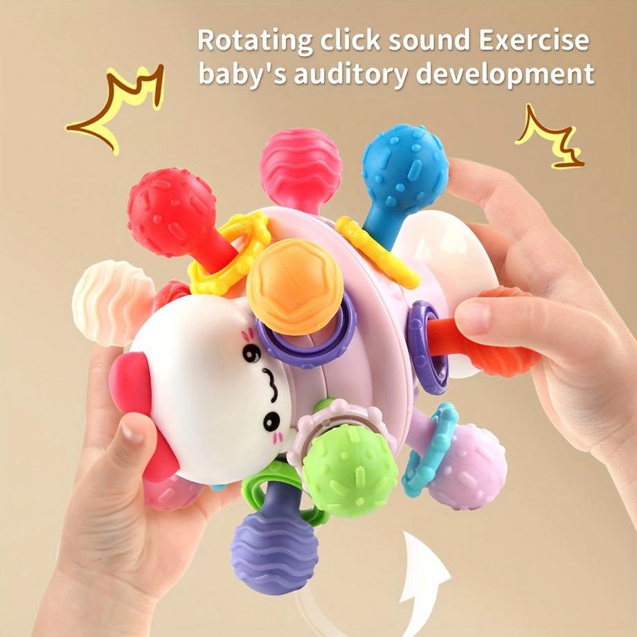 Activity-board  Jouet d'éveil en caoutchouc souple avec clochette, pour la motricité fine et l'éveil sensoriel. 