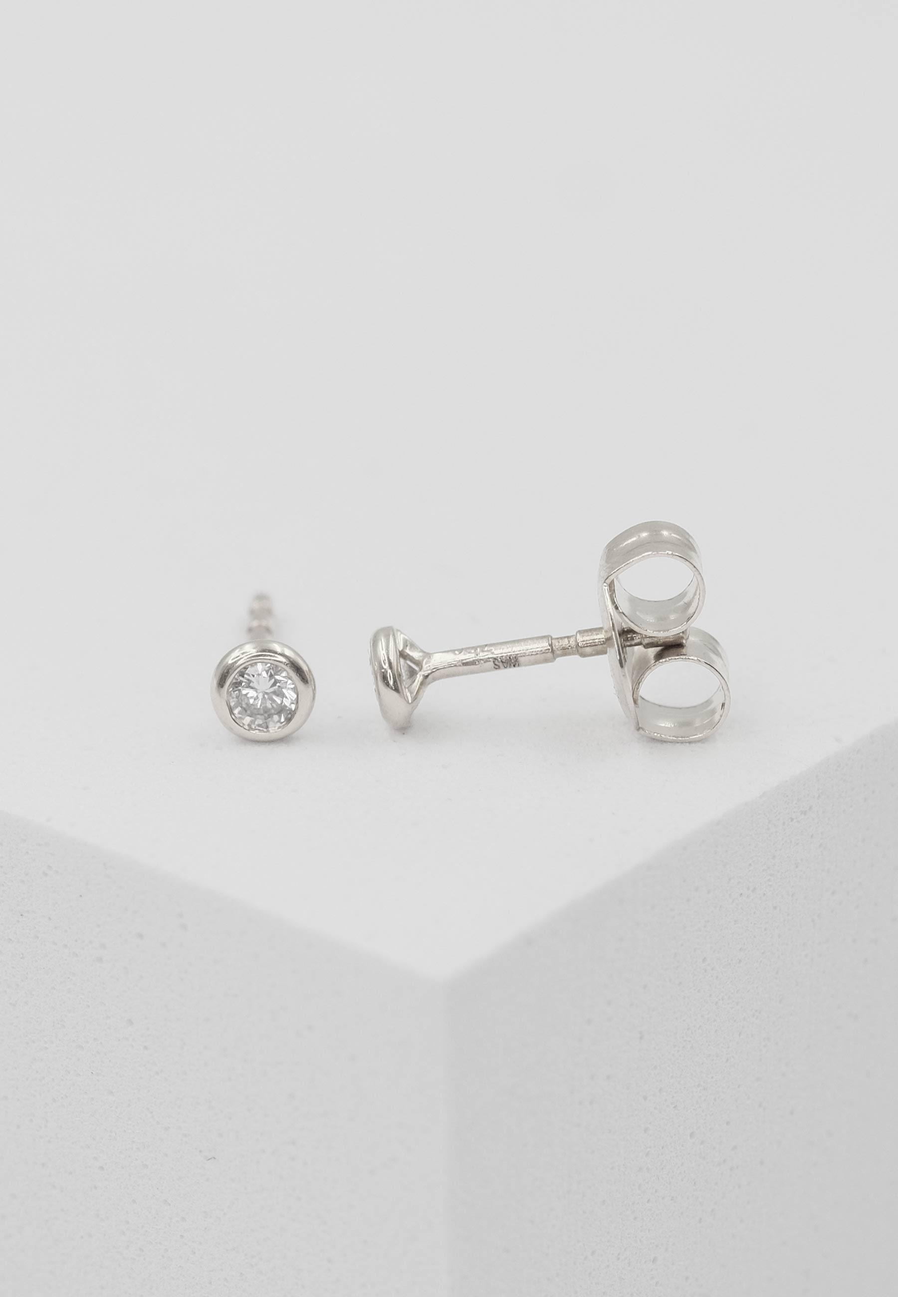 MUAU Schmuck  Clous d'oreilles solitaire monture or blanc 750 diamants 0.10ct. 4.5mm 