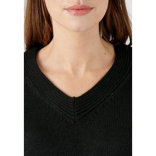 Damart  Pull col V maille jersey souple. 