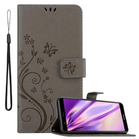 Cadorabo  Housse compatible avec Honor 7X - Coque de protection au design floral avec fermeture magnétique, fonction de support et emplacements pour cartes 