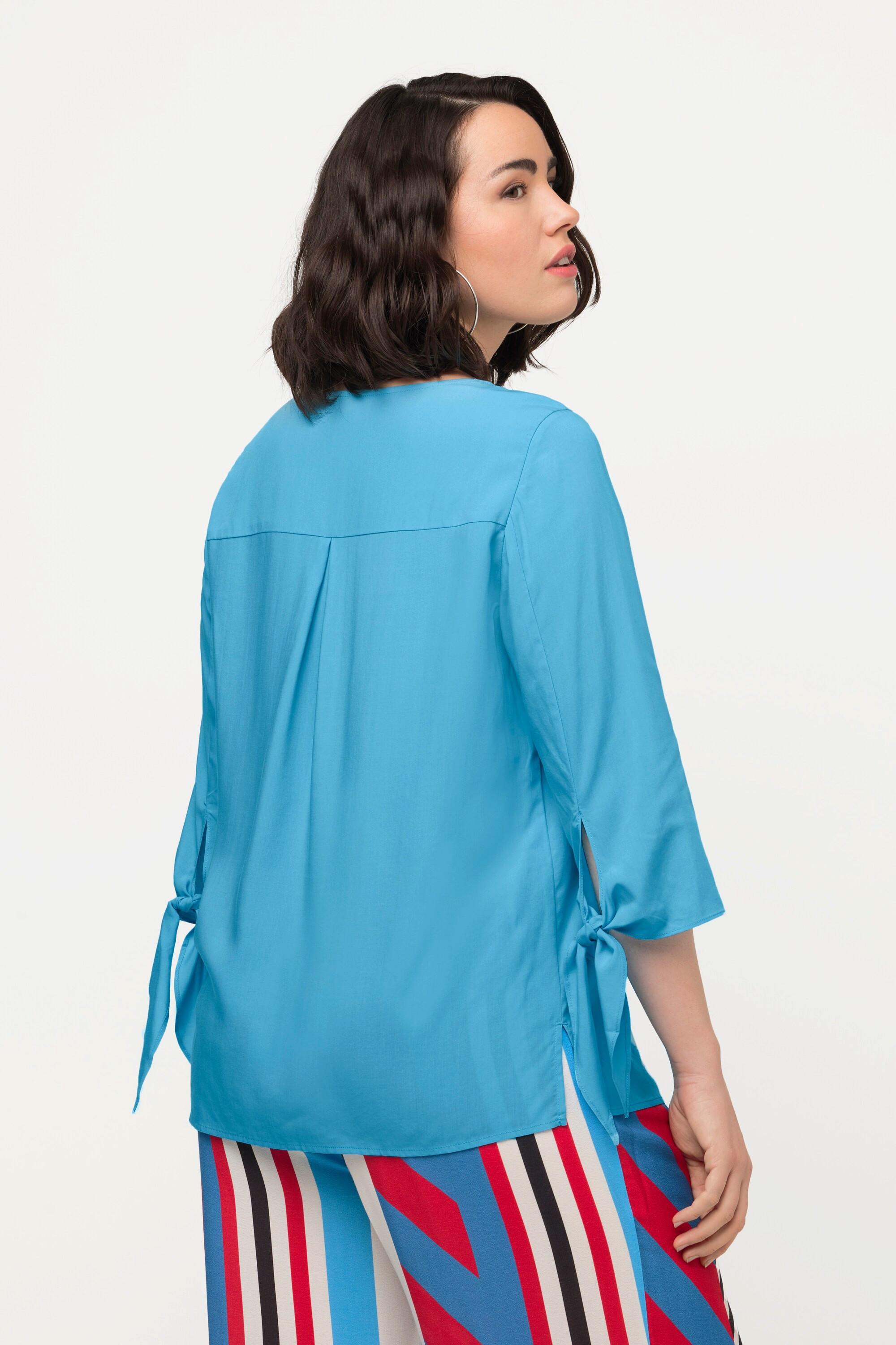 Ulla Popken  Blouse oversize à manches 3/4. Col rond et nœud à la base. 