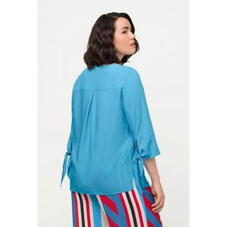 Ulla Popken  Blouse oversize à manches 3/4. Col rond et nœud à la base. 