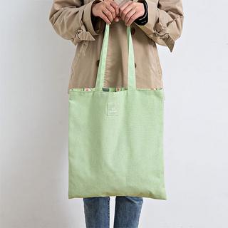 Only-bags.store Wendetragetasche mit Avocado-Print aus Canvas  