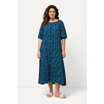 Robe midi à décolleté rond et manches courtes. Base volantée et motif vrilles