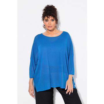 Pull oversize, maille texturée carreaux. Encolure ronde et manches courtes