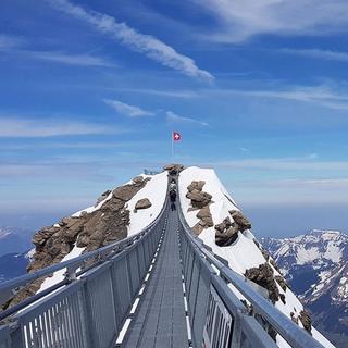 Geschenkidee  Vol au-dessus du Glacier 3000 et fondue au restaurant (pour 2 personnes) 