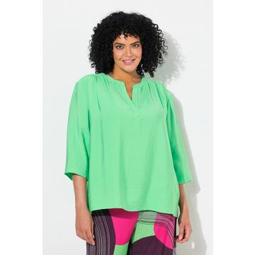 Blusa dal taglio oversize con scollo a tunica e maniche a 3/4