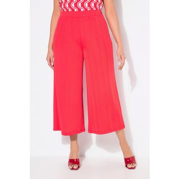 Jupe-culotte en tissu texturé. Taille élastique. Jambe droite, longueur mollet