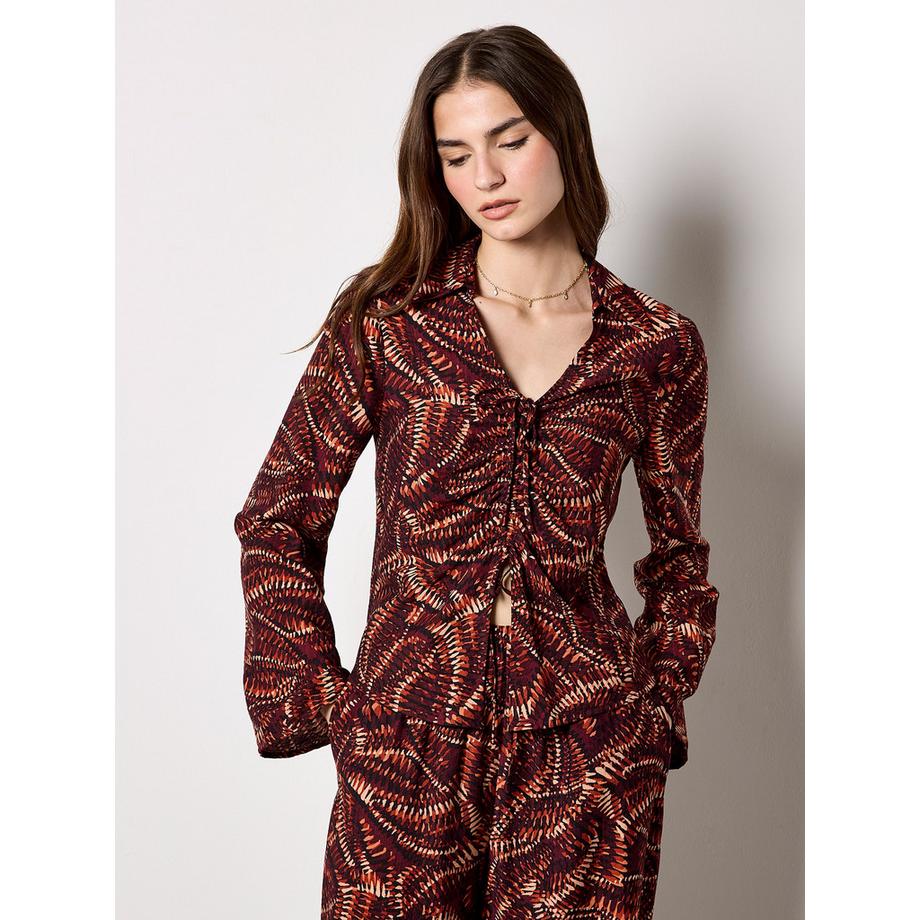 Bluse mit abstraktem Print und geraffter Vorderseite