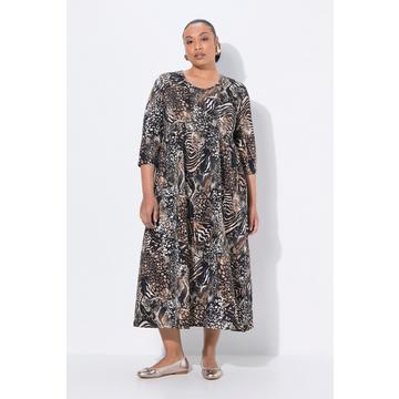 Robe maxi en jersey, avec poches, décolleté rond et manches 3/4, coupe évasée