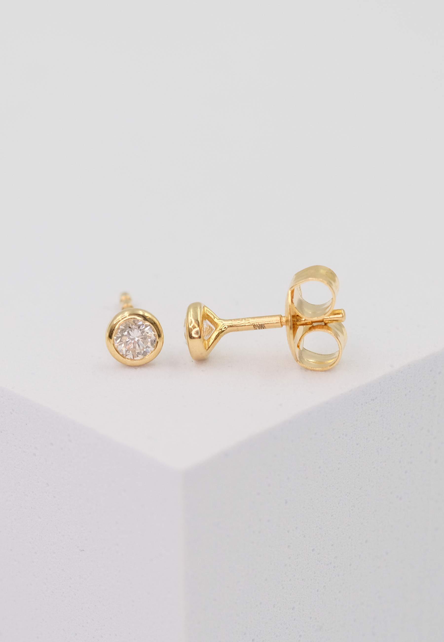 MUAU Schmuck  Clous d'oreilles solitaires monture or jaune 750 diamants 0,20ct. 5mm 