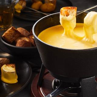 Geschenkidee  Hélicoptère & fondue - Vol au-dessus de l'Eiger, du Mönch & de la Jungfrau (pour 2 personnes) 