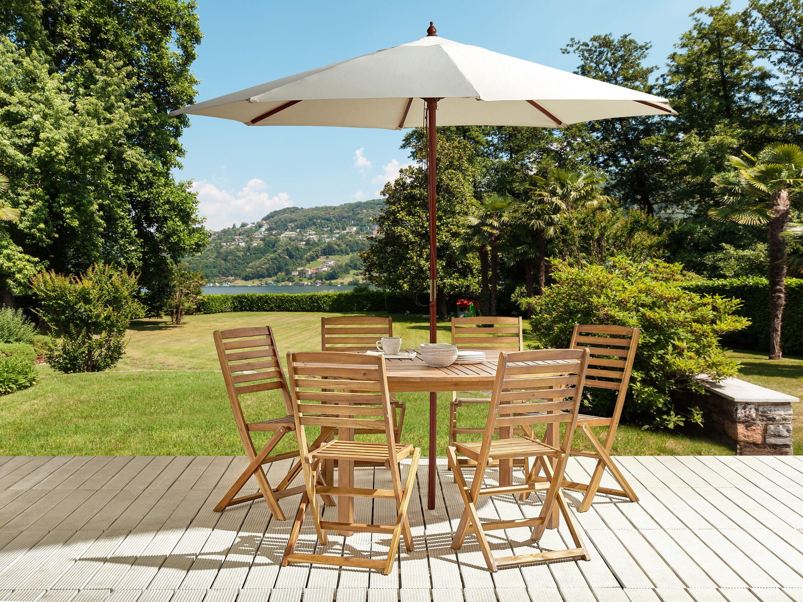 Beliani Table avec chaises et parasol en Acacia Traditionnel TOLVE  