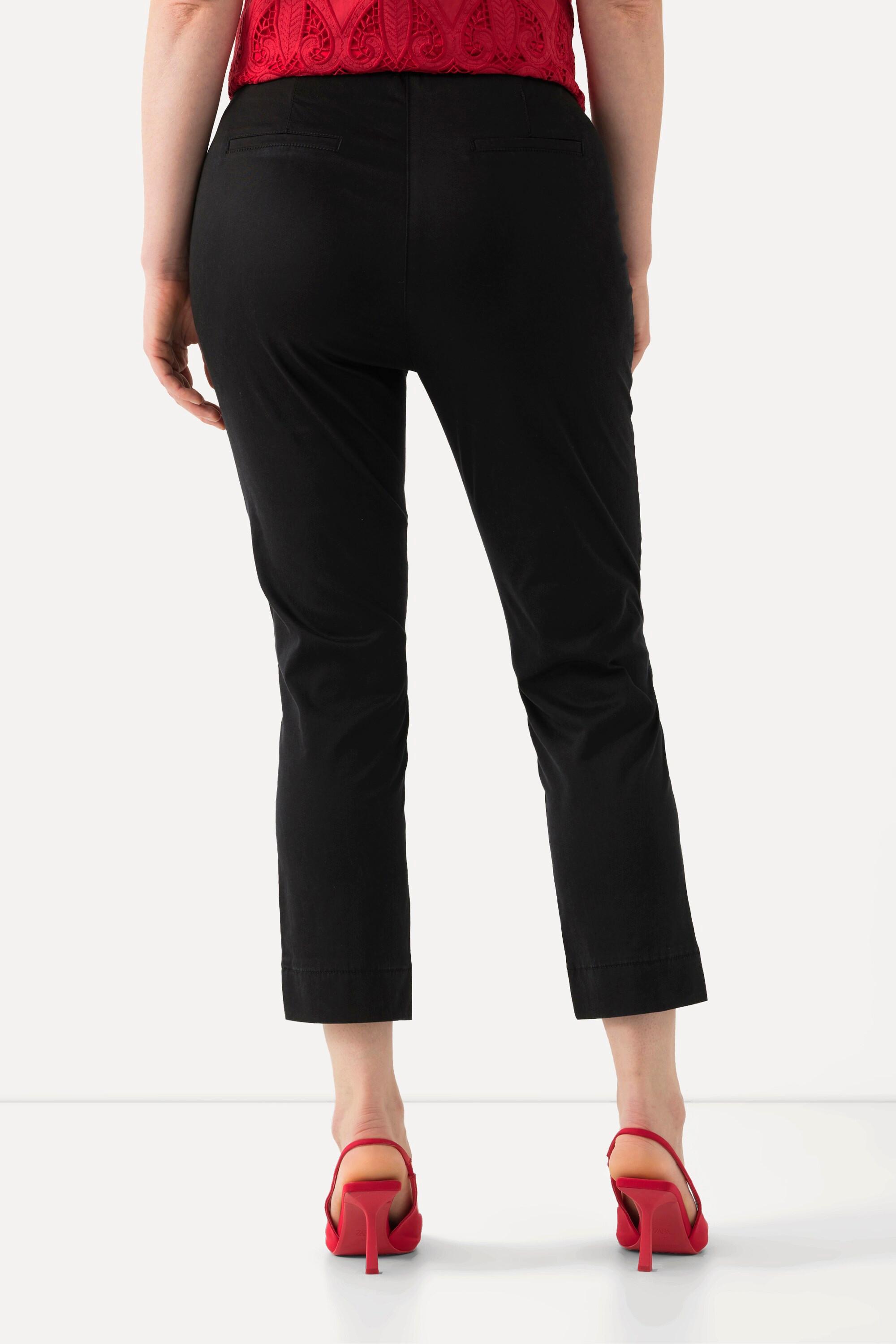 Ulla Popken  Pantalon avec passepoil et taille élastique. Coupe ajustée avec fente sur le bas de jambe. 