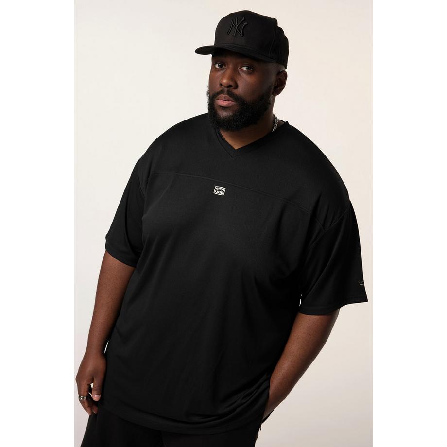 Sthuge Oversized Halbarm T-Shirt mit Rückenprint  