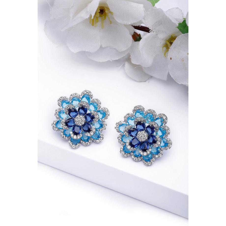 AVANT-GARDE PARIS  Boucles d'oreilles stud florales superposées 