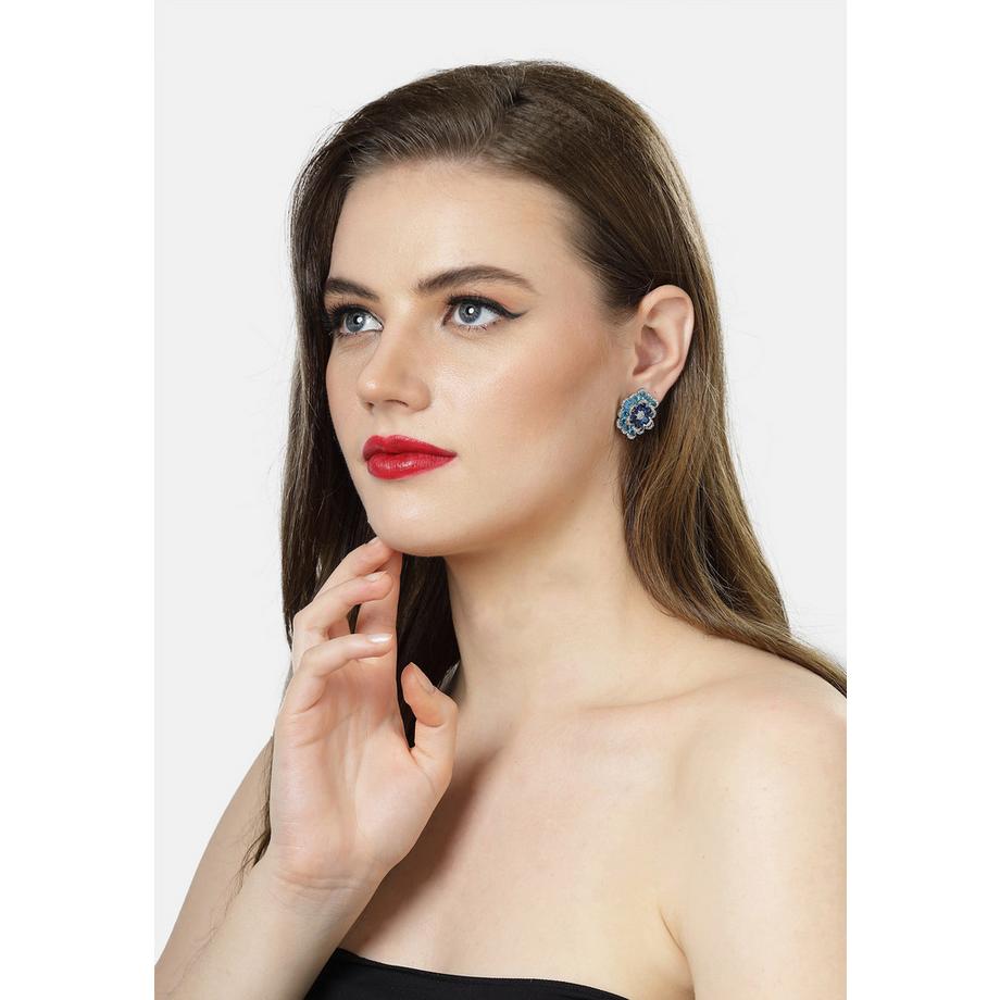 AVANT-GARDE PARIS  Boucles d'oreilles stud florales superposées 