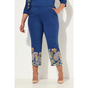 Pantalon en jersey 7/8 à jambe droite. Frise cachemire et taille élastique