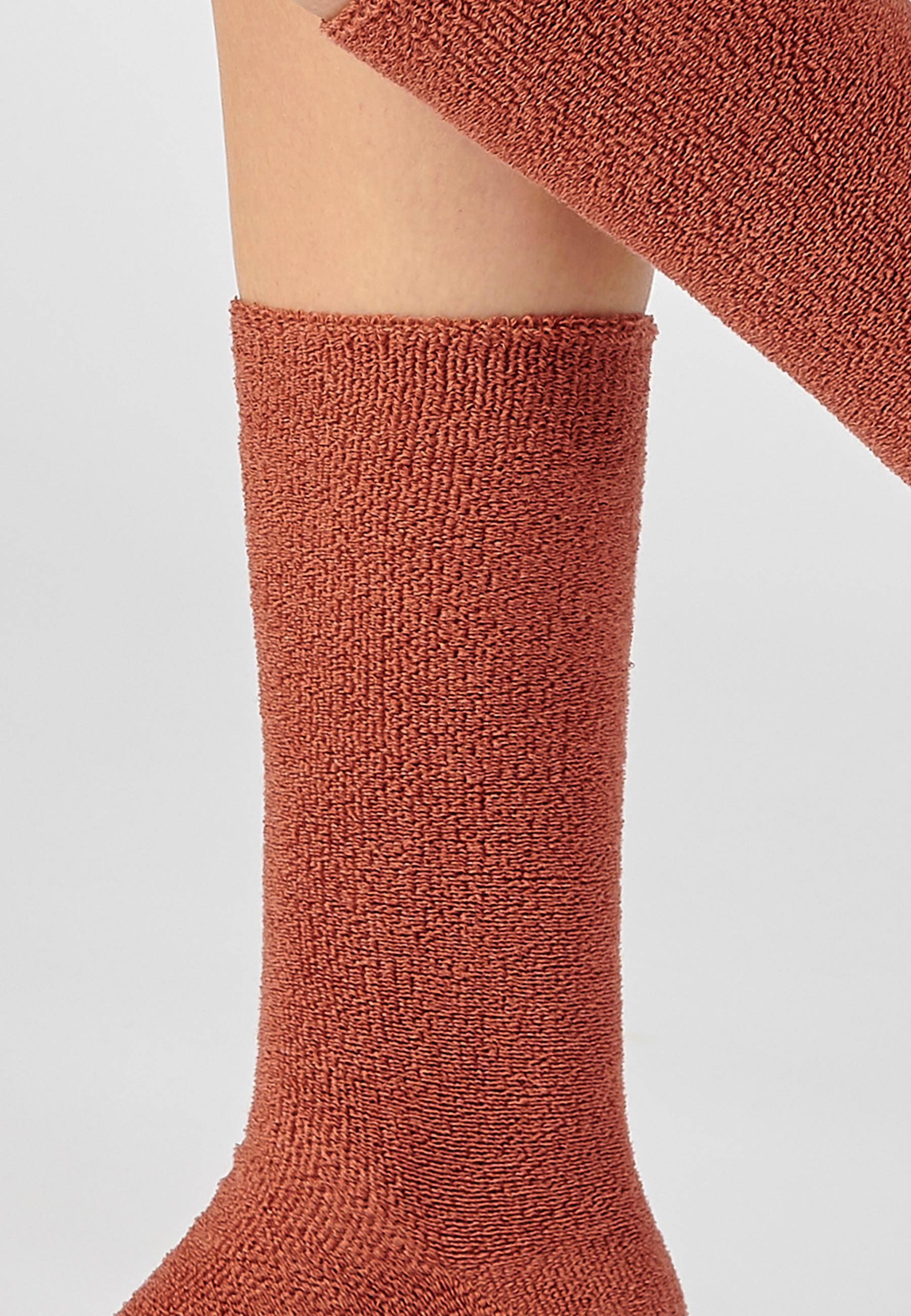 Damart  Chaussettes maille jersey. 