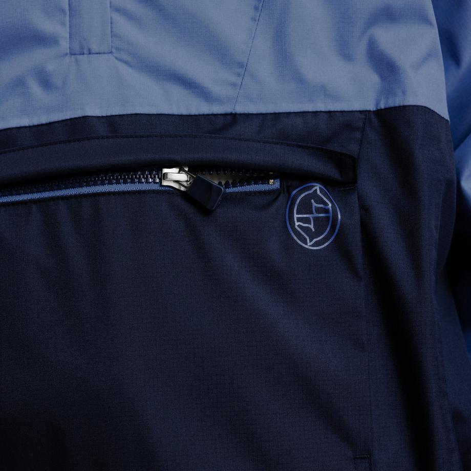 DECATHLON  Wasserdichte Windjacke Junior – Kometblau 