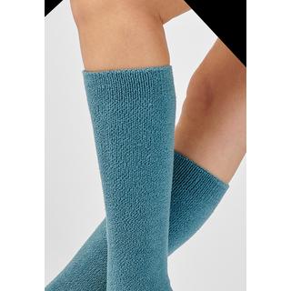 Damart  Chaussettes maille jersey. 