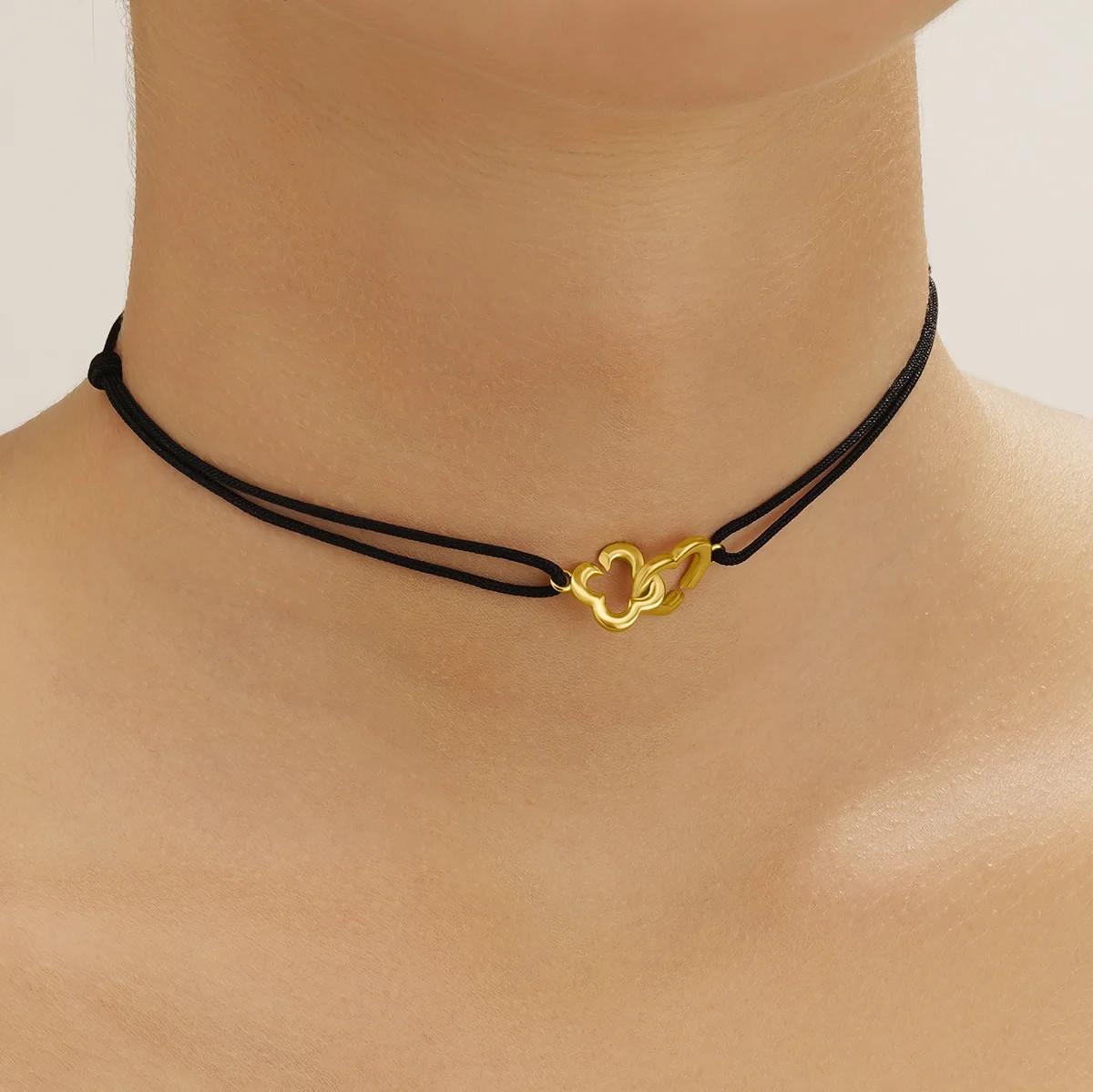 Charles Garnier  PASSION Halsband mit verschlungenem Herz und Kleeblatt aus goldenem Silber 