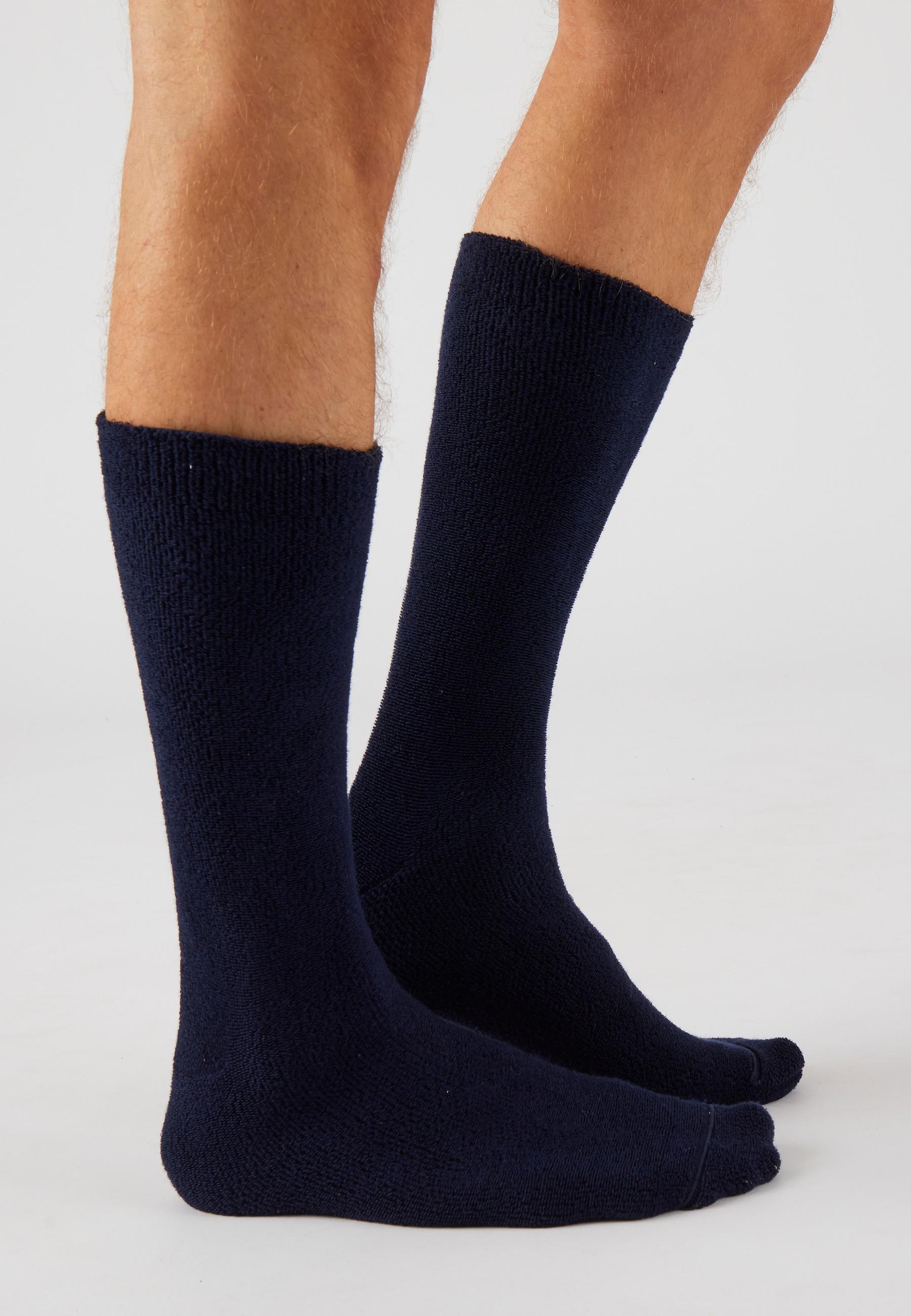 Damart  Chaussettes maille jersey. 