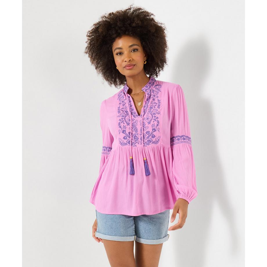 Besticktes Oberteil mit Quasten und Bindeband