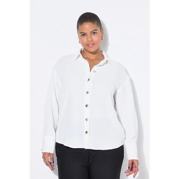 Chemisier oversize. Boutons fantaisie