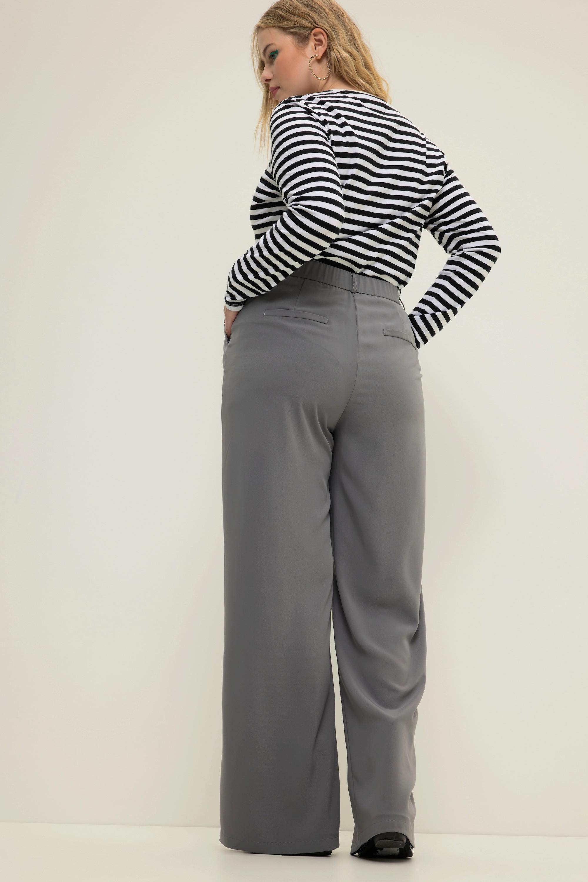 Studio Untold  Pantalon à taille haute et jambe large. Pinces, taille partiellement élastique 