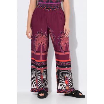 Pantalon palazzo, imprimé palmiers. Jambe large et taille élastique