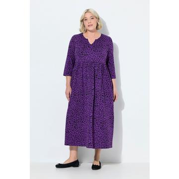 Abito di jersey dal taglio svasato con tasche, scollo a tunica e maniche a 3/4