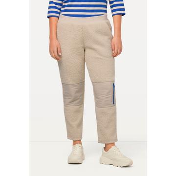 Pantaloni di morbidissimo teddy con cintura elastica e toppe all'altezza delle ginocchia