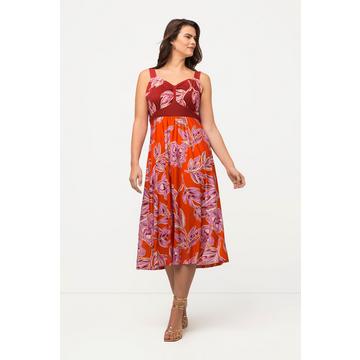 Robe midi sans manches. Imprimé floral et col en V.