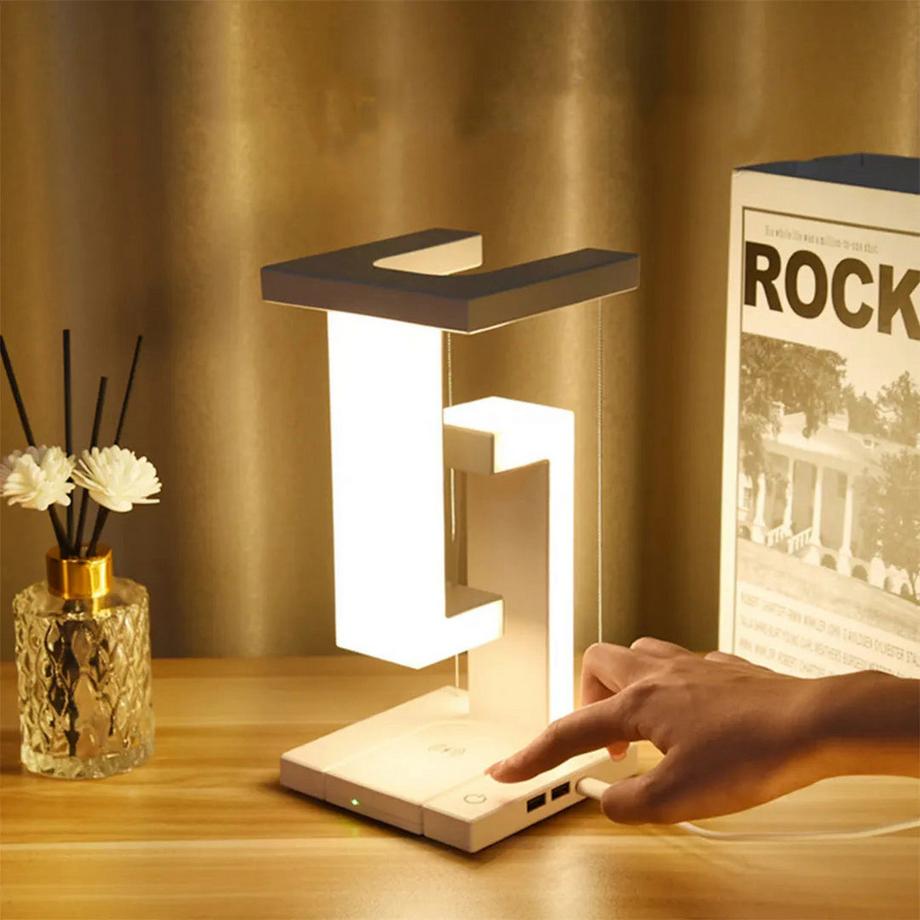 YUWANET  Elegante Tischlampe "anti-gravity" mit Ladestation 