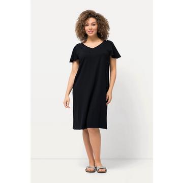 Robe midi en jersey, avec décolleté en V et manches courtes évasées. Silhouette en A.