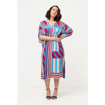 Robe midi oversize, imprimé graphique. Col rond et manches courtes.