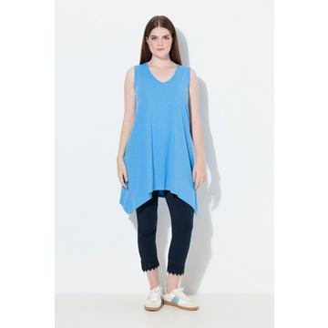 Top dal taglio lungo e svasato in cotone biologico con orlo a punte e scollo a V