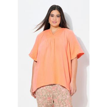 Blusa dal taglio svasato in mussola con scollo a tunica e mezze maniche