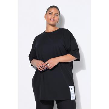 T-shirt dal taglio oversize con applicazione sull'orlo e mezze maniche