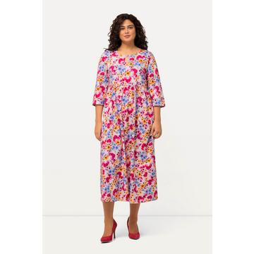 Robe en jersey, imprimé floral. Décolleté rond, découpe « trou de serrure ». Manches 3/4.