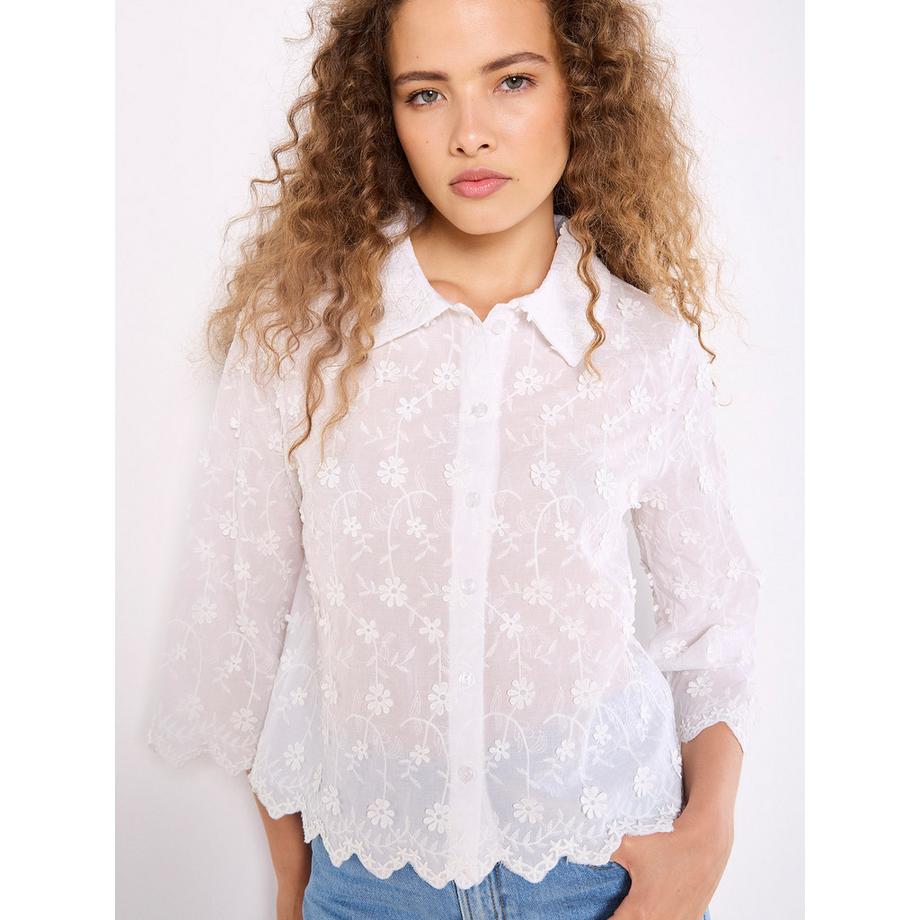 Chemise courte à fleurs appliquées