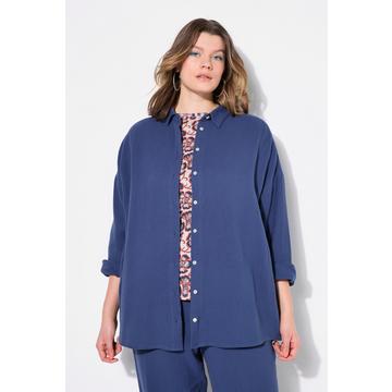 Blusa di mussola dal taglio oversize con collo da camicia e maniche lunghe