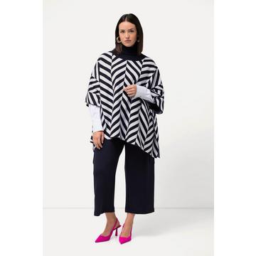 Cape en maille, motif Jacquard. Col roulé. Esprit poncho.